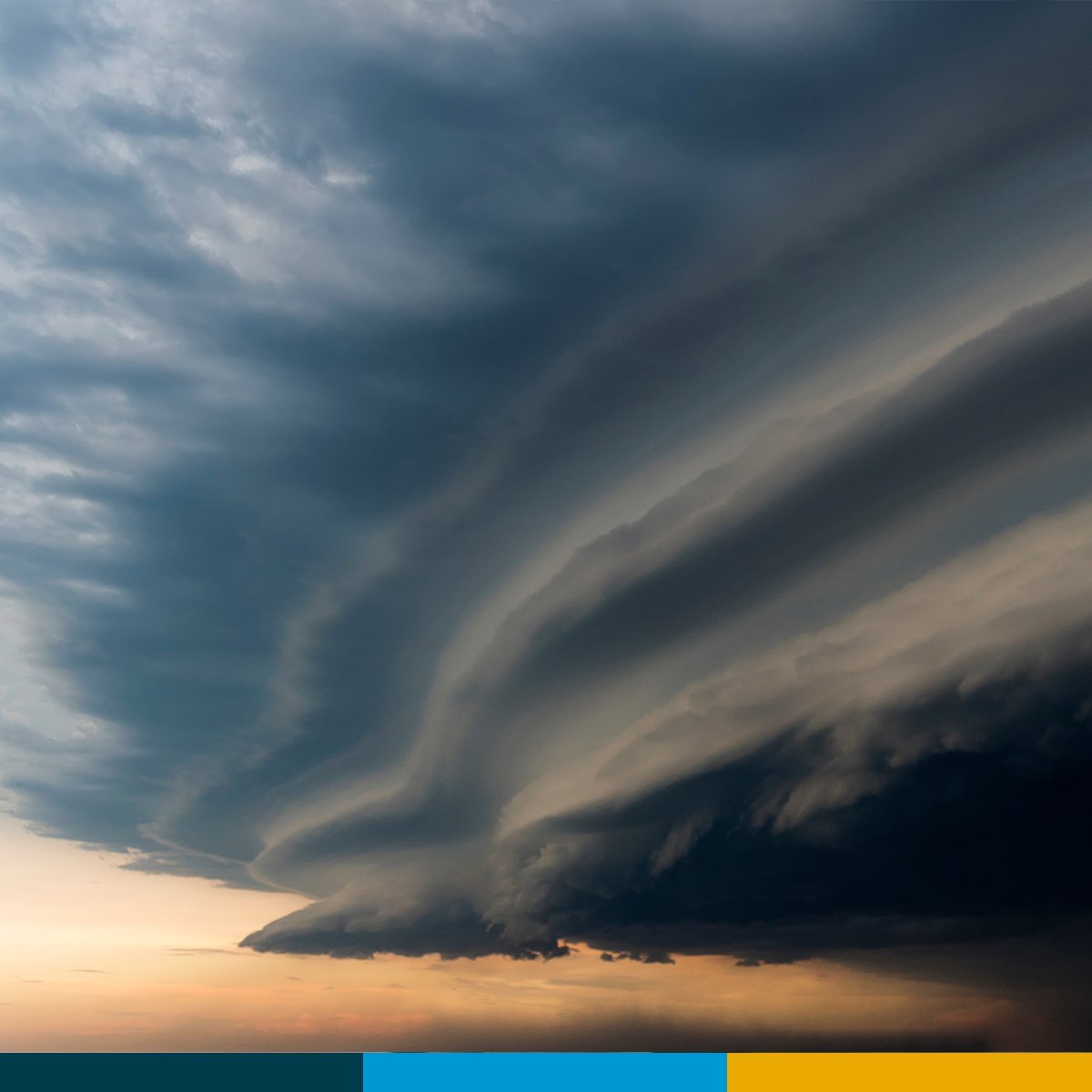 Storm clouds approaching at dusk, signaling the start of Atlantic hurricane season for fuel site operators